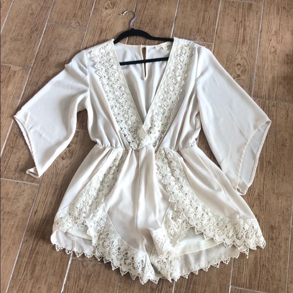 Lace deep cut romper